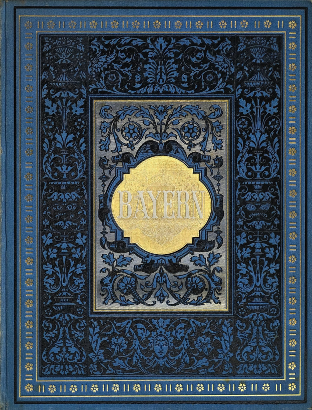Ein blau-goldenes Buch mit dem Wort "Bayern" darauf, verziert mit aufwendigen Designs.
