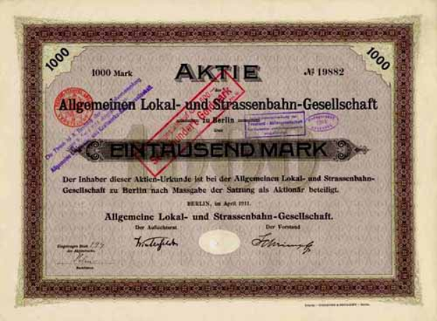 Ein altes deutsches Aktienzertifikat, ausgestellt von der deutschen Regierung, mit Text und Zahlen.