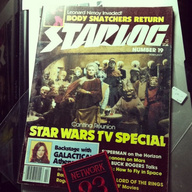 Ein Magazin-Cover mit dem Namen 'Star Log' und Bildern mehrerer Personen.