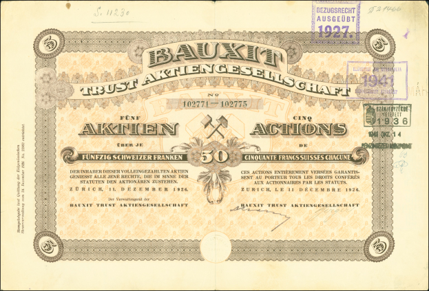 Ein altes deutsches Banknoten mit schwarzem Hintergrund, das ein Männerporträt, den Text "Bauxit Trust Aktiengesellschaft" und einen Stempel auf der rechten Seite zeigt.
