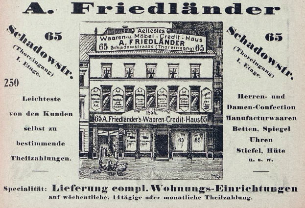 Schwarze und weiße Anzeige für einen Friedländer-Laden in Deutschland, die ein Gebäude mit Text auf der Fassade zeigt.