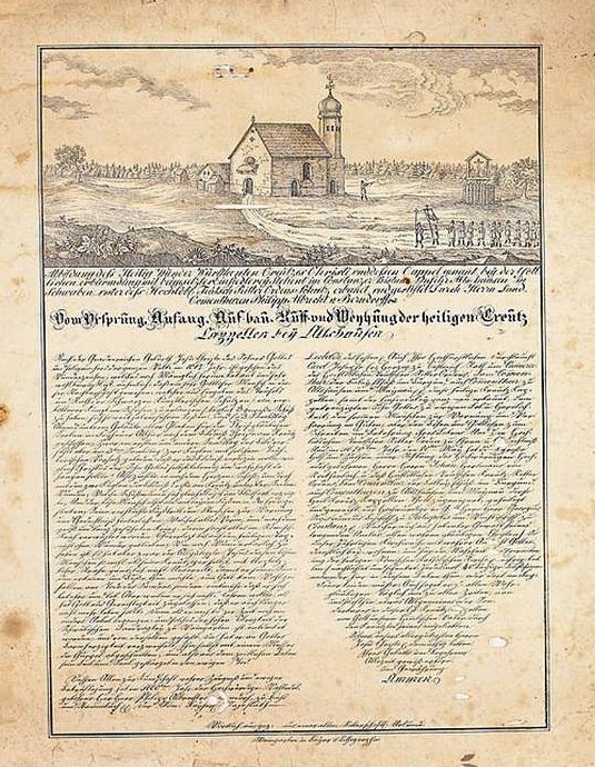 Ein verblichenes Exemplar des ersten Entwurfs der deutschen Verfassung mit einer zentralen Illustration einer Kirche im Hintergrund.