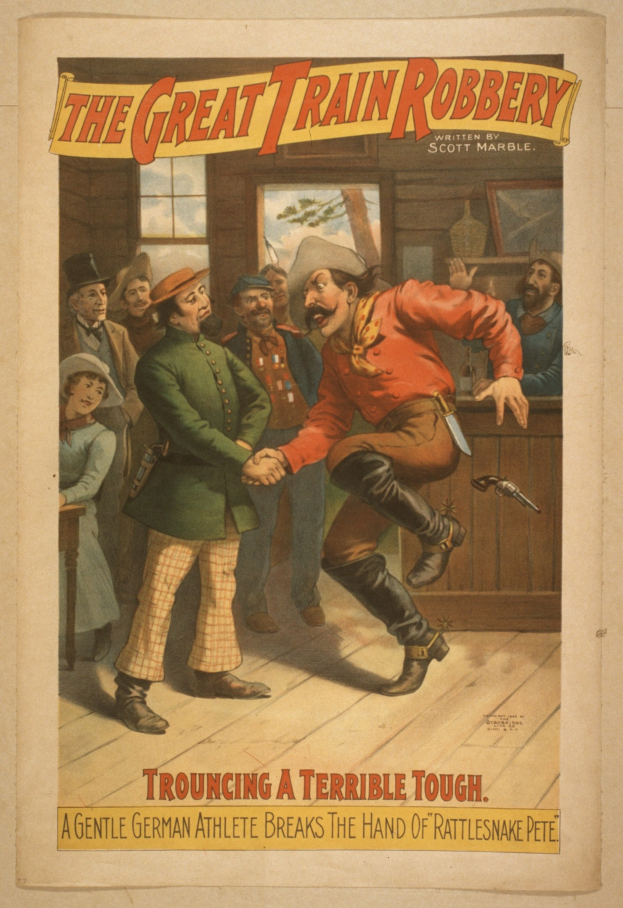 Plakat, das eine Gruppe von Menschen zeigt, die drinnen stehen, wobei einer eine Waffe hält, ein Fenster und eine Wand im Hintergrund und den Text "Der große Zugraub - Trouching a Terrible Tough" oben und unten.